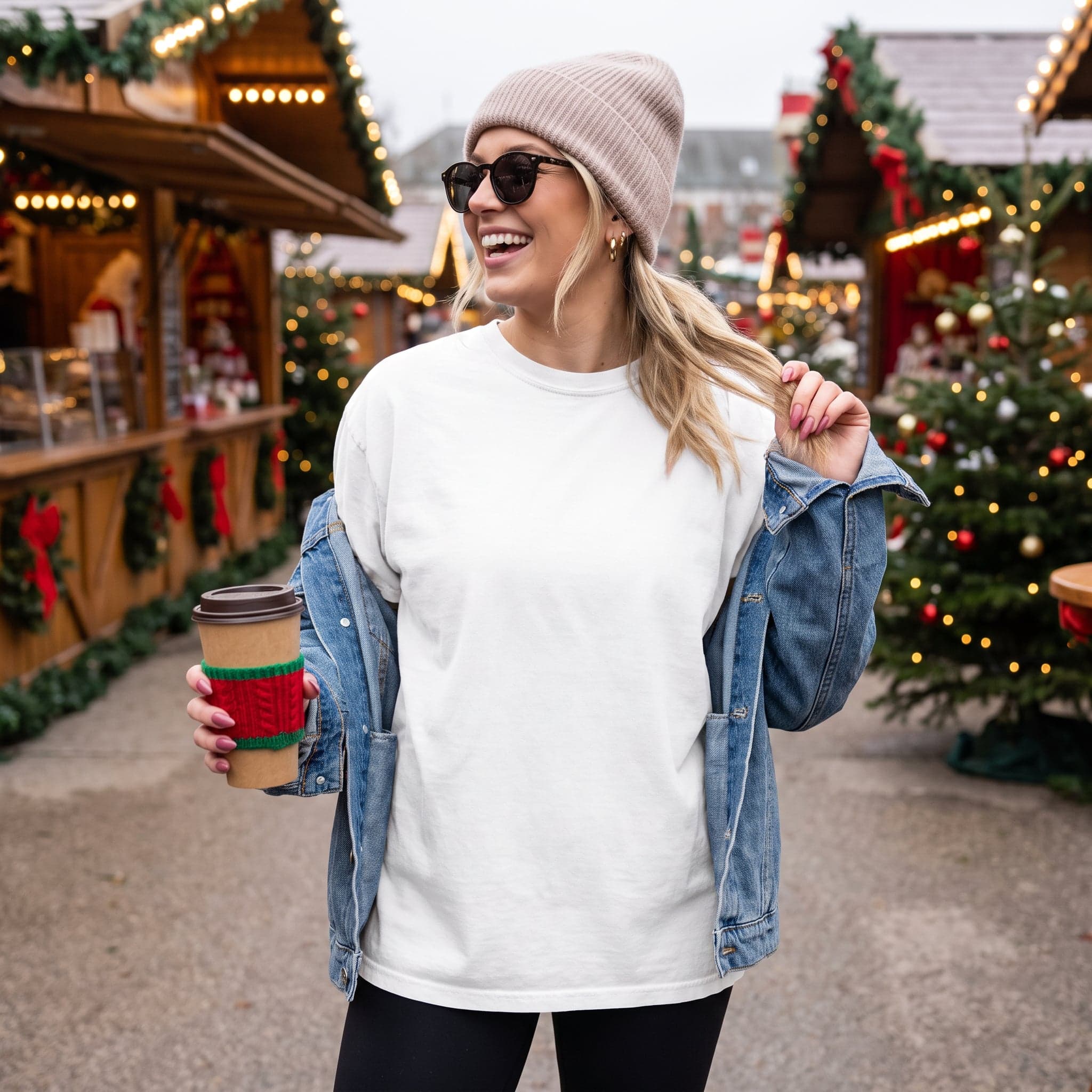 Pale mint Comfort Colors 1717 t-shirt worn under a camel coat on a snowy city street — chest panel completely empty